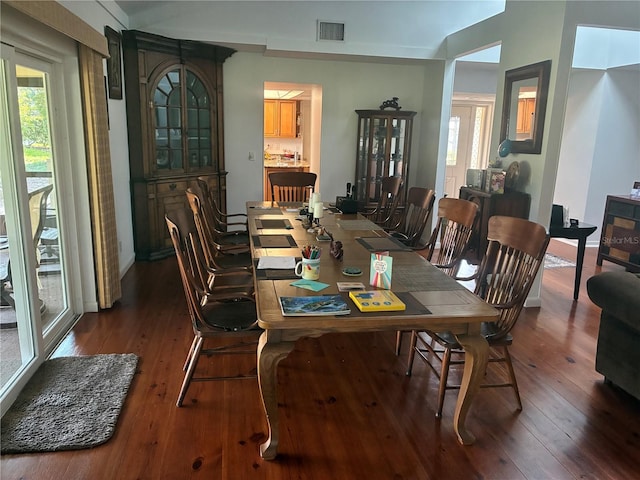 116 Oakmont Ln, New Smyrna Beach, FL 32168 - dining space featuring dark wood-style floors and plenty of natural light