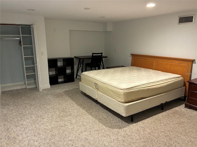 116 Oakmont Ln, New Smyrna Beach, FL 32168 - bedroom featuring light colored carpet, recessed lighting, and a closet