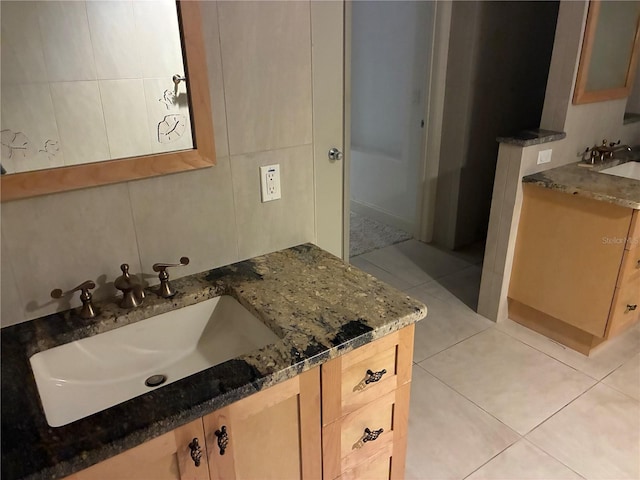 116 Oakmont Ln, New Smyrna Beach, FL 32168 - bathroom featuring vanity and tile patterned flooring