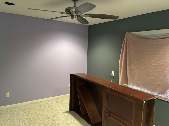 116 Oakmont Ln, New Smyrna Beach, FL 32168 - staircase with carpet flooring, a ceiling fan, and baseboards