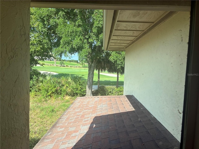 116 Oakmont Ln, New Smyrna Beach, FL 32168 - view of patio / terrace featuring golf course view
