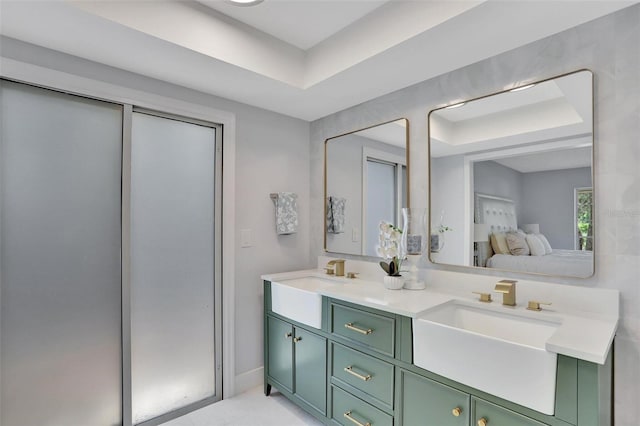 140 Sweet Bay Cir, Lake Mary, FL 32746 - full bath with double vanity, a raised ceiling, and connected bathroom