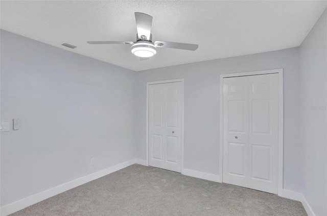 140 Sweet Bay Cir, Lake Mary, FL 32746 - unfurnished bedroom with carpet, baseboards, and ceiling fan