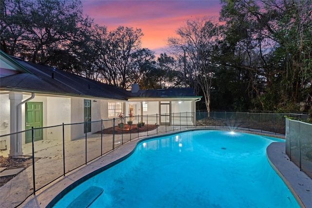 140 Sweet Bay Cir, Lake Mary, FL 32746 - pool at dusk featuring a patio area