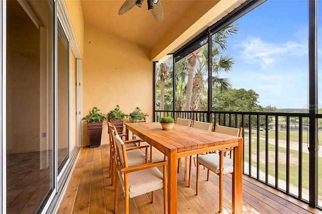 14 Camino Real Blvd Unit 14, Howey In The Hills, FL 34737 - sunroom featuring vaulted ceiling