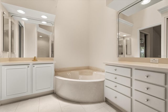 14 Camino Real Blvd Unit 14, Howey In The Hills, FL 34737 - bathroom featuring a bath, vanity, and tile patterned flooring