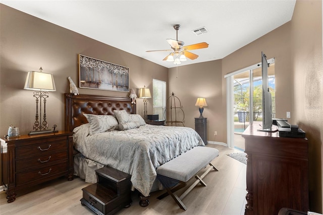 2359 Baronsmede Ct, Winter Garden, FL 34787 - bedroom with access to exterior, light wood-type flooring, ceiling fan, and baseboards