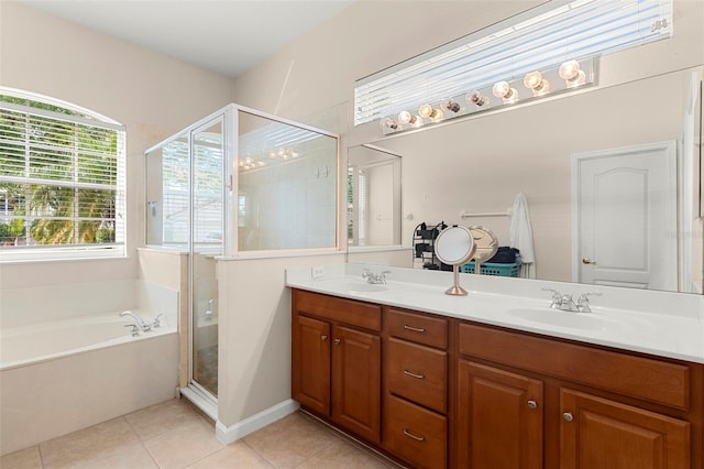 2359 Baronsmede Ct, Winter Garden, FL 34787 - bathroom with a bath, a stall shower, double vanity, and tile patterned floors