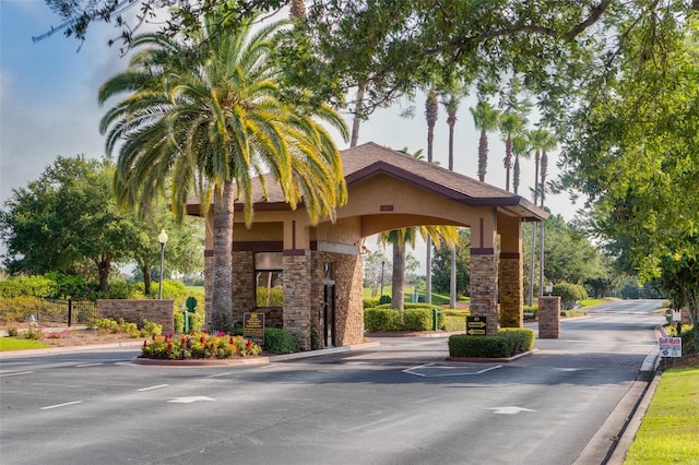 2359 Baronsmede Ct, Winter Garden, FL 34787 - view of asphalt street featuring curbs and street lights