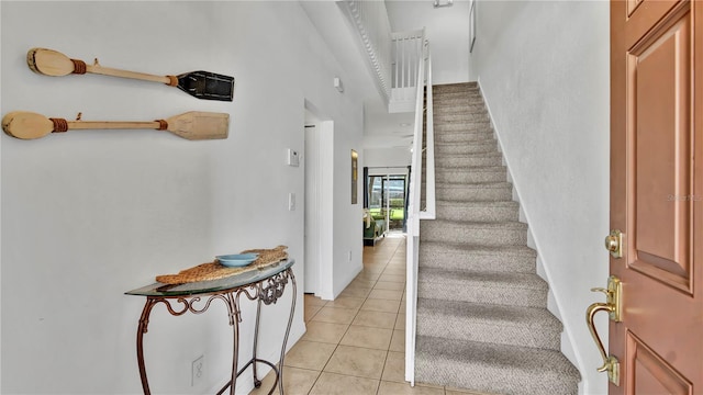 2343 Caravelle Cir, Kissimmee, FL 34746 - stairway featuring tile patterned floors