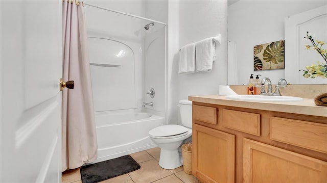 2343 Caravelle Cir, Kissimmee, FL 34746 - bathroom featuring tile patterned flooring, shower / bath combination with curtain, vanity, and toilet