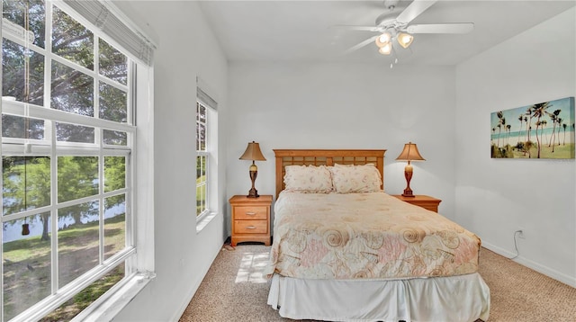 2343 Caravelle Cir, Kissimmee, FL 34746 - bedroom featuring carpet floors, baseboards, and ceiling fan