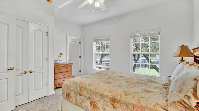 2343 Caravelle Cir, Kissimmee, FL 34746 - carpeted bedroom featuring a ceiling fan