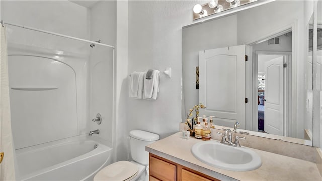 2343 Caravelle Cir, Kissimmee, FL 34746 - bathroom featuring vanity, bathing tub / shower combination, and toilet