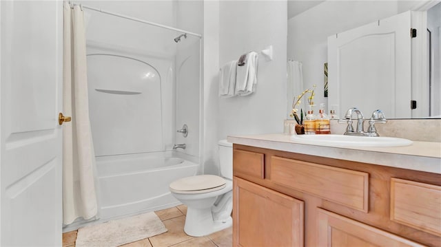 2343 Caravelle Cir, Kissimmee, FL 34746 - full bathroom with vanity, shower / bath combination with curtain, tile patterned flooring, and toilet