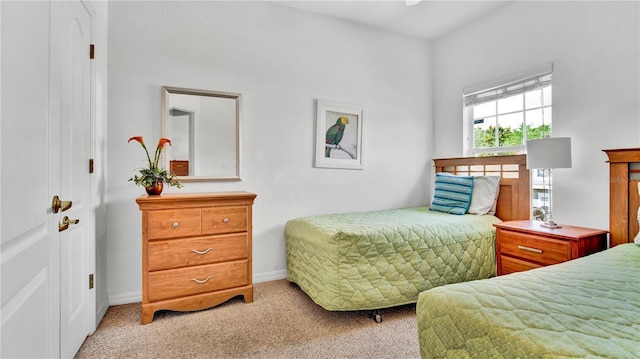 2343 Caravelle Cir, Kissimmee, FL 34746 - bedroom featuring carpet floors and baseboards