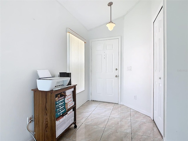 2314 Cormorant St, Kissimmee, FL 34743 - entryway featuring lofted ceiling and light tile patterned floors