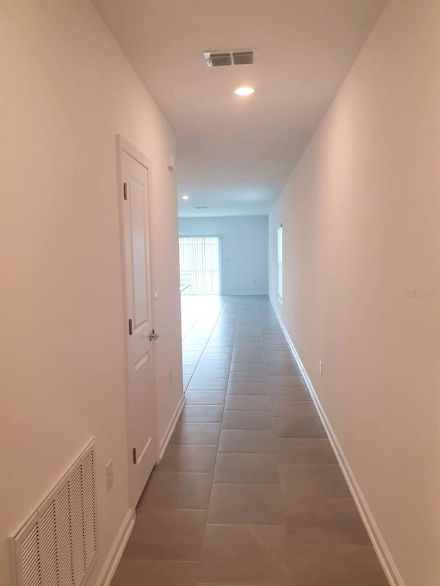 2002 Punch Bowl Ave, Davenport, FL 33837 - corridor with tile patterned flooring and recessed lighting