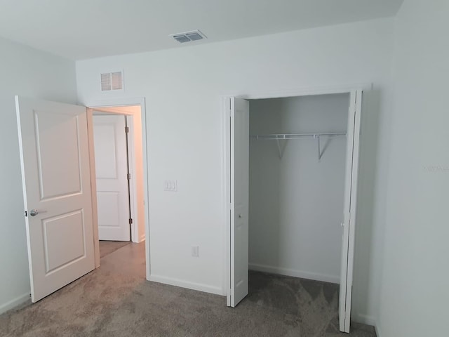 2002 Punch Bowl Ave, Davenport, FL 33837 - unfurnished bedroom featuring carpet floors and a closet
