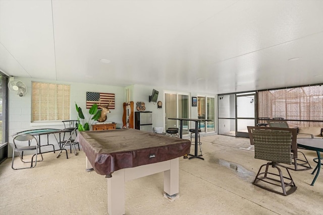 7011 Archwood Dr, Orlando, FL 32819 - game room featuring pool table and healthy amount of natural light