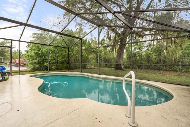 7011 Archwood Dr, Orlando, FL 32819 - outdoor pool with a patio area and glass enclosure