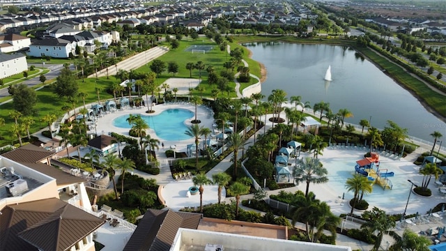 1544 Nassau Point Trl, Kissimmee, FL 34747 - aerial view of residential area with a large body of water and a pool area
