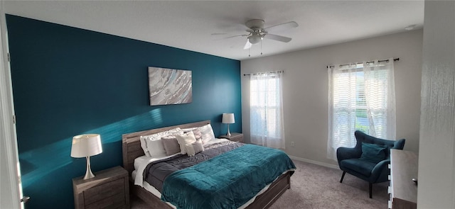 1544 Nassau Point Trl, Kissimmee, FL 34747 - carpeted bedroom featuring a ceiling fan and baseboards