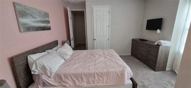 1544 Nassau Point Trl, Kissimmee, FL 34747 - bedroom featuring light colored carpet and baseboards