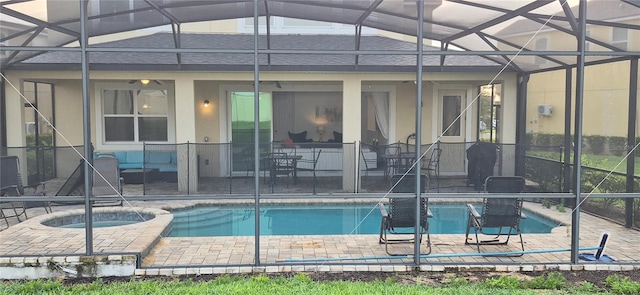 1544 Nassau Point Trl, Kissimmee, FL 34747 - outdoor pool with a patio area, a lanai, and an in-ground hot tub