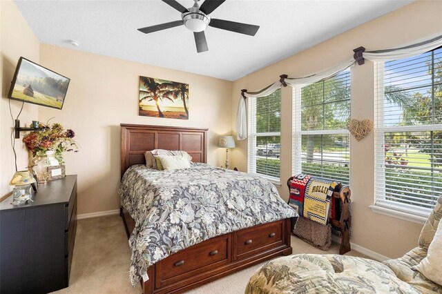 3551 Statham Dr, Apopka, FL 32712 - bedroom with multiple windows, light colored carpet, and baseboards