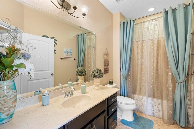 3551 Statham Dr, Apopka, FL 32712 - bathroom with vanity, toilet, shower / bath combo with shower curtain, a textured ceiling, and tile patterned floors