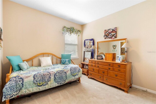 3551 Statham Dr, Apopka, FL 32712 - carpeted bedroom featuring baseboards