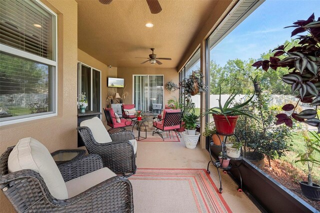 3551 Statham Dr, Apopka, FL 32712 - sunroom / solarium featuring ceiling fan, carpet flooring, and a textured ceiling