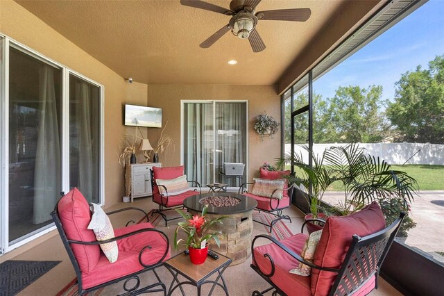 3551 Statham Dr, Apopka, FL 32712 - sunroom / solarium featuring an outdoor living space with a fire pit, ceiling fan, recessed lighting, and a textured ceiling