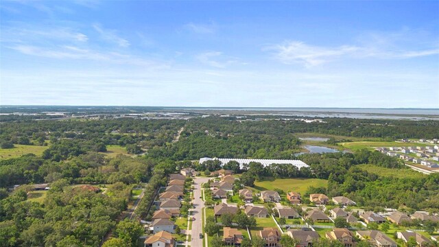 3551 Statham Dr, Apopka, FL 32712 - view of property location featuring a nearby body of water, nearby suburban area, and a heavily wooded area