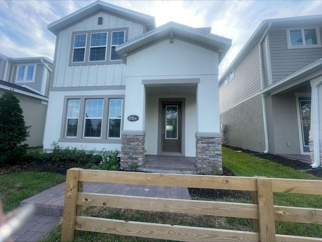 1354 Twelve Oaks Rd, Saint Cloud, FL 34771 - view of front facade with board and batten siding and stucco siding