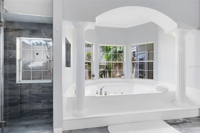 718 Glen Eagle Dr, Winter Springs, FL 32708 - full bathroom with decorative columns, a stall shower, a jetted tub, and crown molding