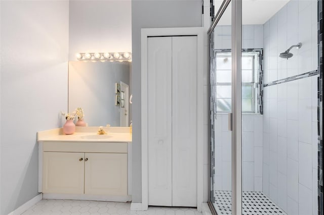 718 Glen Eagle Dr, Winter Springs, FL 32708 - full bathroom featuring a shower stall, vanity, and baseboards