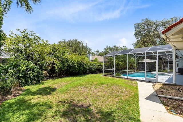 718 Glen Eagle Dr, Winter Springs, FL 32708 - view of green lawn with an outdoor pool and a lanai