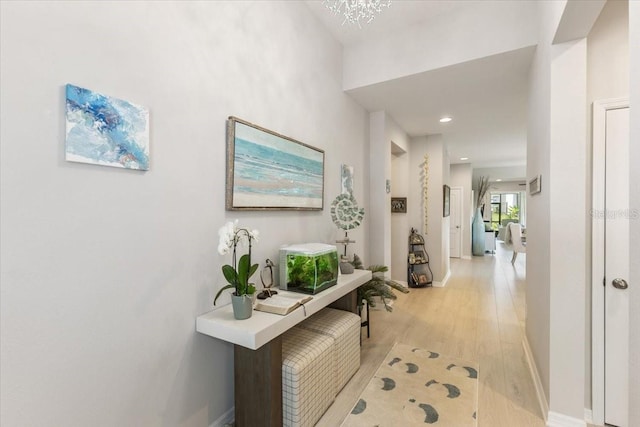 1382 Foltz Loop, Oakland, FL 34787 - hallway featuring light wood-style flooring, baseboards, and recessed lighting