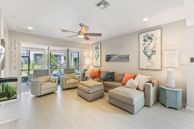 1382 Foltz Loop, Oakland, FL 34787 - living room featuring light wood-style floors, a ceiling fan, and recessed lighting