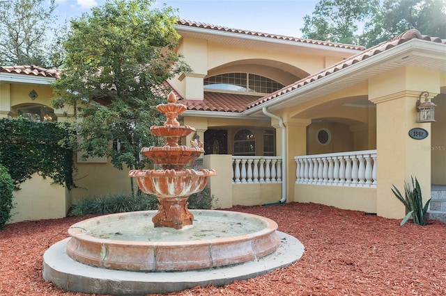 1542 Islay Ct, Apopka, FL 32712 - view of front of property featuring a tiled roof and stucco siding