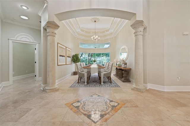 1542 Islay Ct, Apopka, FL 32712 - dining room featuring decorative columns, ornamental molding, baseboards, arched walkways, and a chandelier
