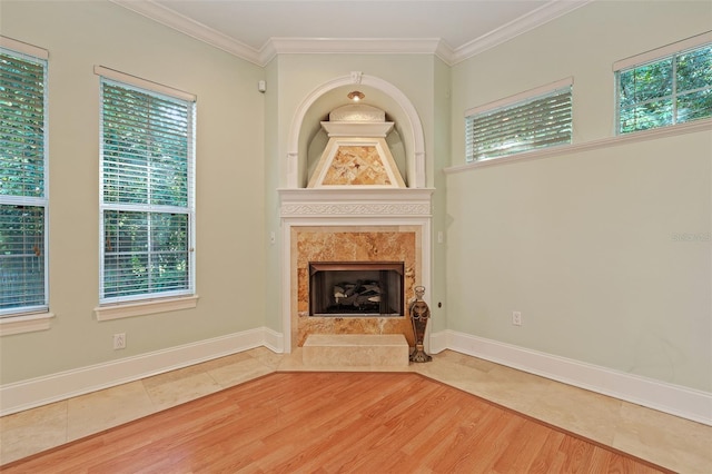 1542 Islay Ct, Apopka, FL 32712 - unfurnished living room with tile patterned flooring, ornamental molding, a fireplace with flush hearth, and baseboards