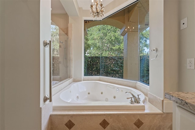 1542 Islay Ct, Apopka, FL 32712 - full bath featuring a jetted tub, a chandelier, vanity, and a shower