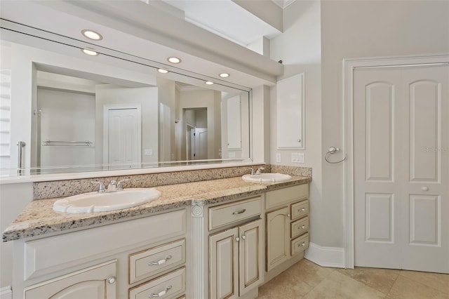 1542 Islay Ct, Apopka, FL 32712 - bathroom with double vanity, tile patterned floors, and baseboards