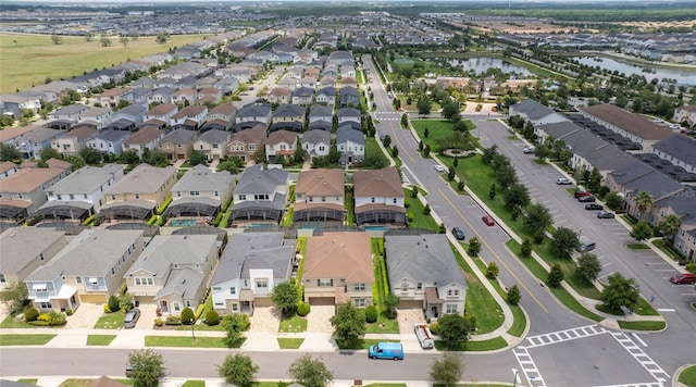 1505 Nassau Point Trl, Kissimmee, FL 34747 - aerial view of residential area with a nearby body of water
