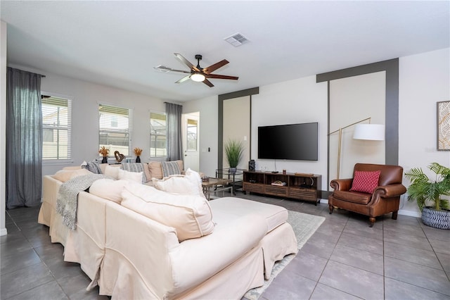 1505 Nassau Point Trl, Kissimmee, FL 34747 - living area with a ceiling fan, tile patterned flooring, and baseboards