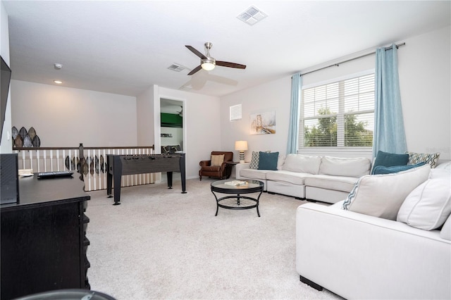 1505 Nassau Point Trl, Kissimmee, FL 34747 - living area featuring ceiling fan and light carpet