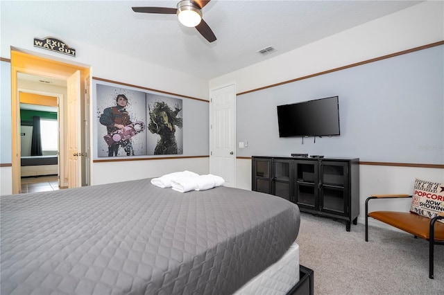 1505 Nassau Point Trl, Kissimmee, FL 34747 - bedroom featuring carpet floors and a ceiling fan